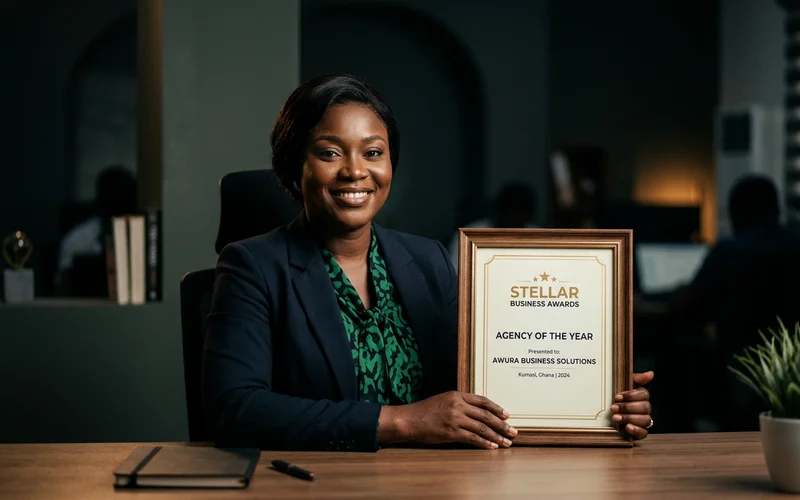 The Stellar Business Awards certificate on a desk at the Kumasi office